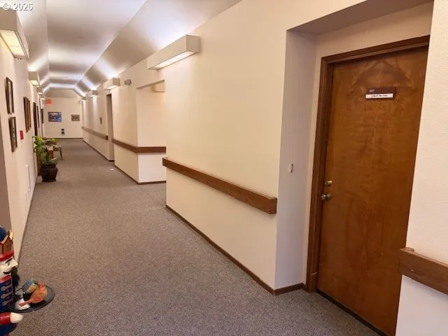 a view of a hallway with closet
