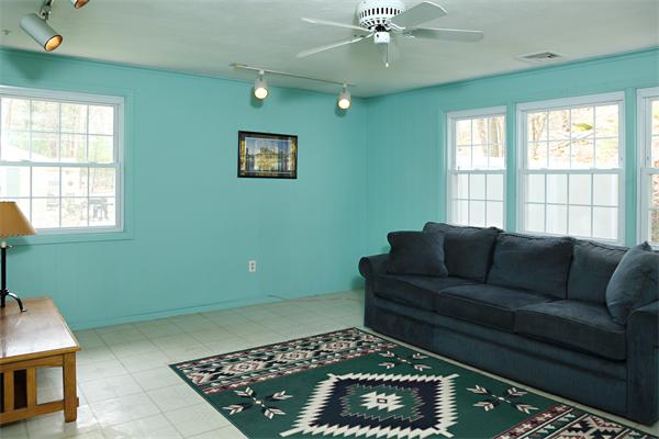 6 Marina Road Chelmsford, MA 01824 - Photo 4 of 7 a living room with furniture and a rug