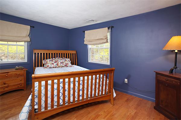 6 Marina Road Chelmsford, MA 01824 - Photo 5 of 7 a bedroom with a bed and a window