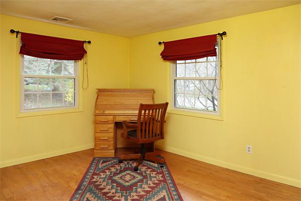 6 Marina Road Chelmsford, MA 01824 - Photo 6 of 7 a view of room with window and wooden floor