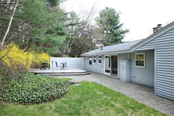 6 Marina Road Chelmsford, MA 01824 - Photo 7 of 7 a front view of a house with a yard