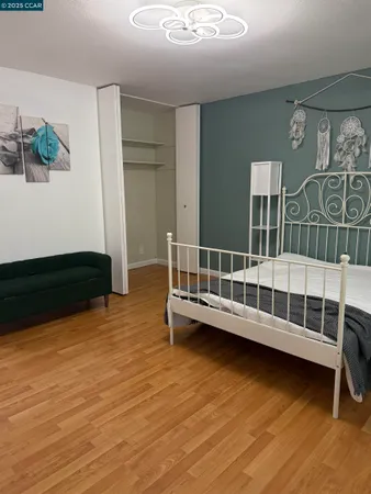 a view of a balcony with wooden floor