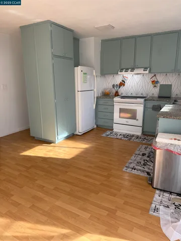 a storage room with washer and dryer