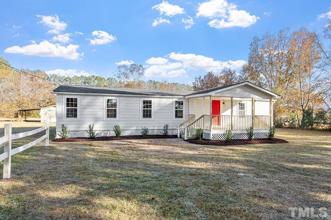 a view of a house with a patio