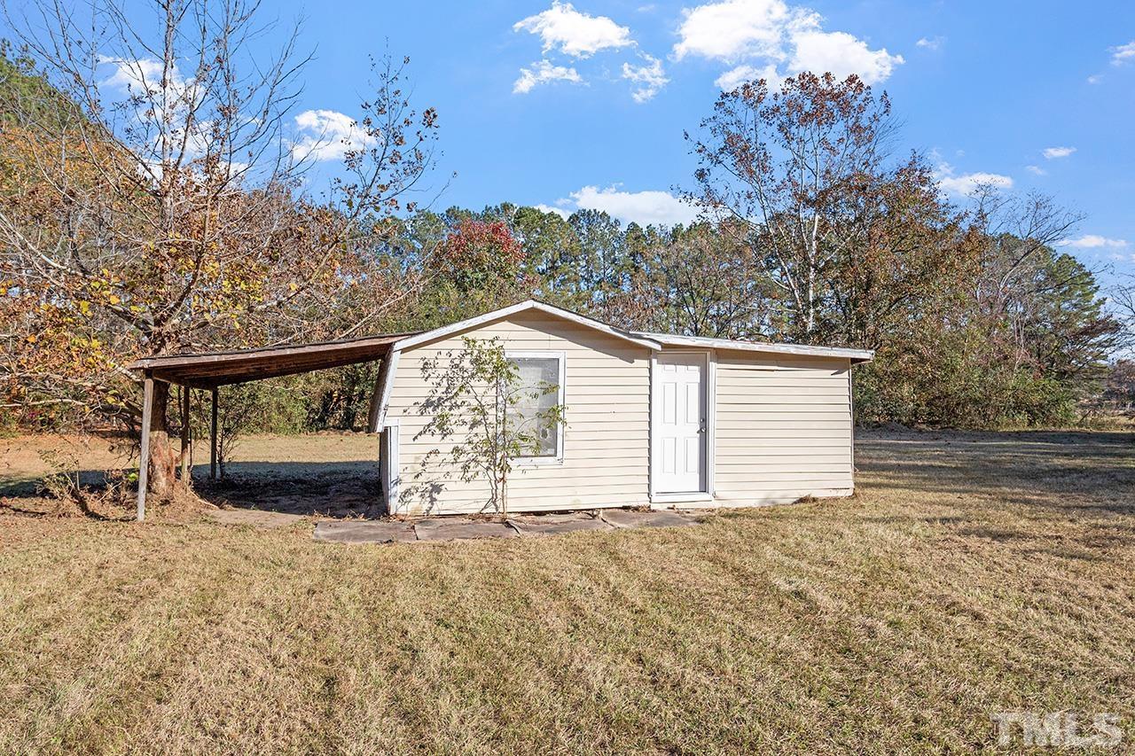 313 Smith Road Smithfield, NC 27577 - Photo 35 of 36 a view of outdoor space and yard