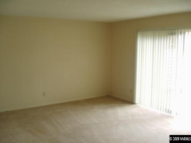 540 Wellington Way Reno, NV 89506 - Photo 5 of 8 an empty room with a window