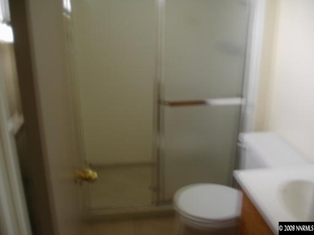 540 Wellington Way Reno, NV 89506 - Photo 7 of 8 a white toilet sitting next to a white sink