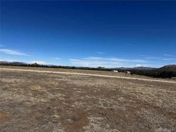 a view of street with parked cars