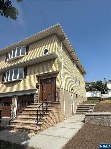 a view of a building with a street