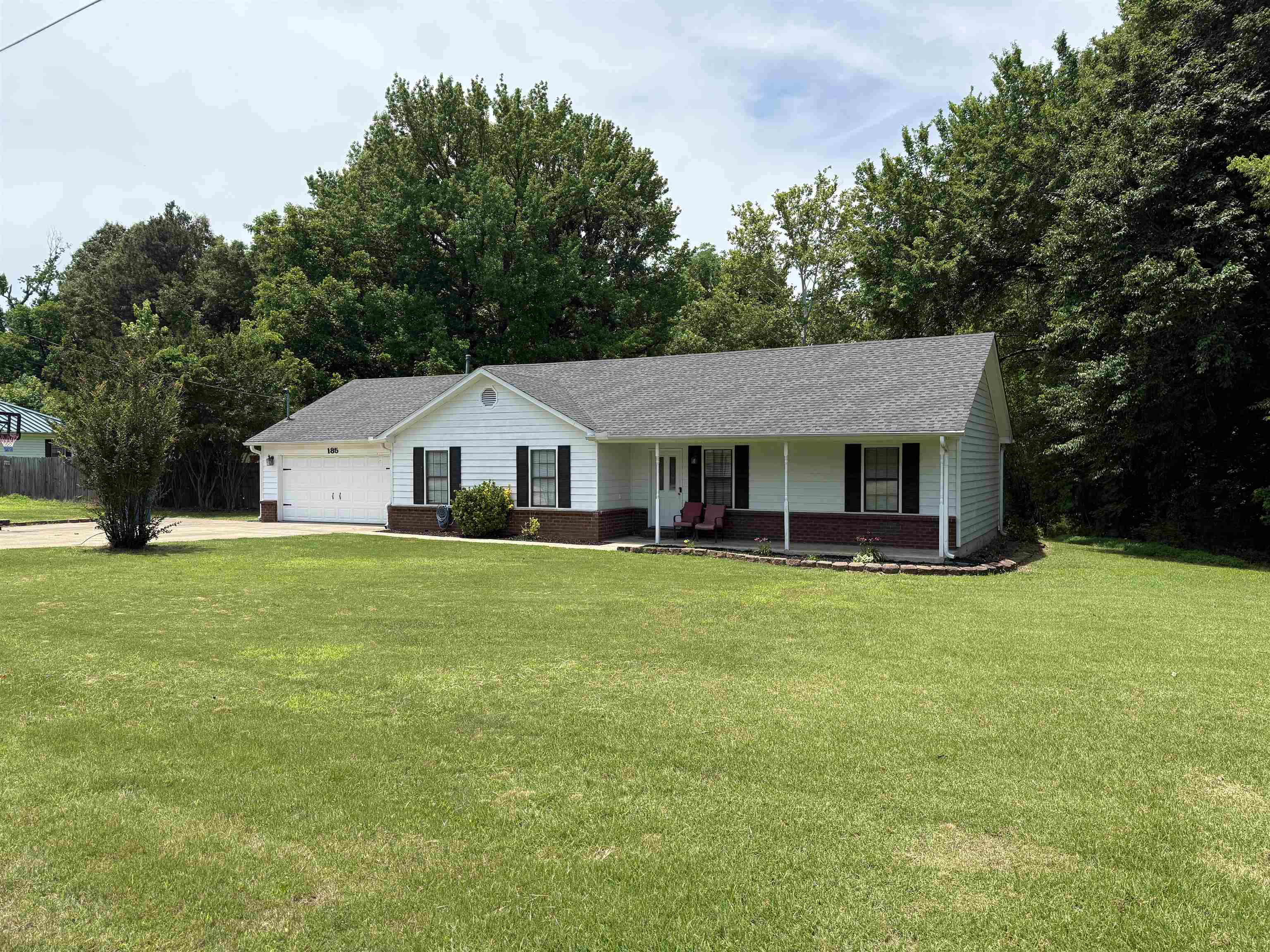 185 Mignon Road Atoka, TN 38004 - Photo 7 of 34 Single-story residence featuring white siding and a dark shingle roof
