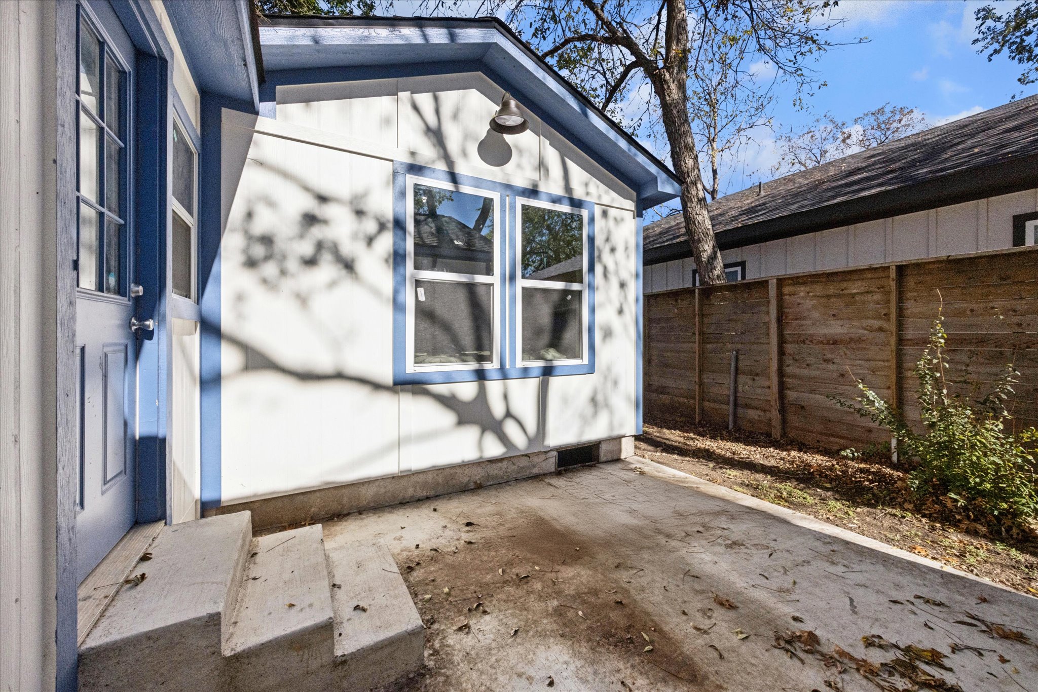 907 East 53rd Street Austin, TX 78751 - Photo 20 of 30 View of side of property with a patio area