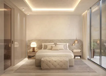 a bedroom with a bed and a mirror