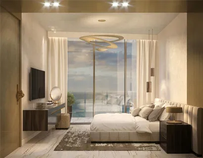 a bedroom with a bed and glass door