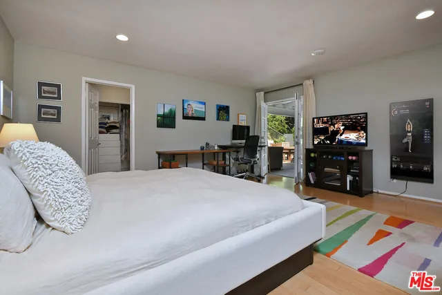 a bathroom with a shower and a sink