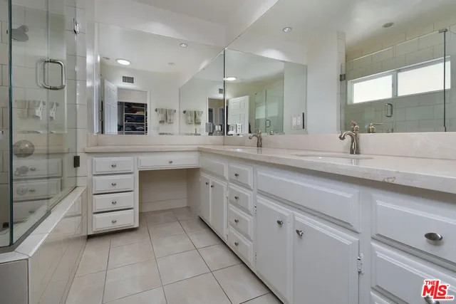 a view of a chairs and tables in the patio