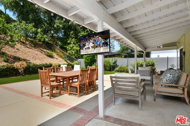 a view of a park with plants and trees
