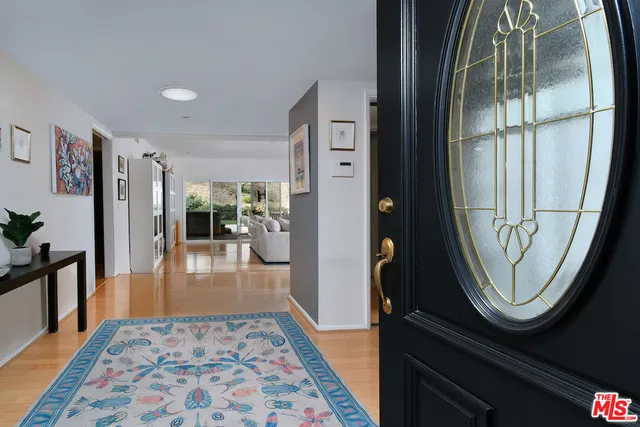 a view of a back yard of the house