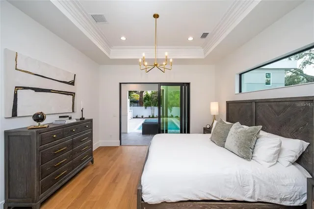 a bathroom with a double vanity sink and mirror