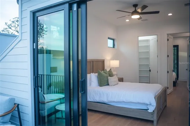 a view of a dining room with furniture and window