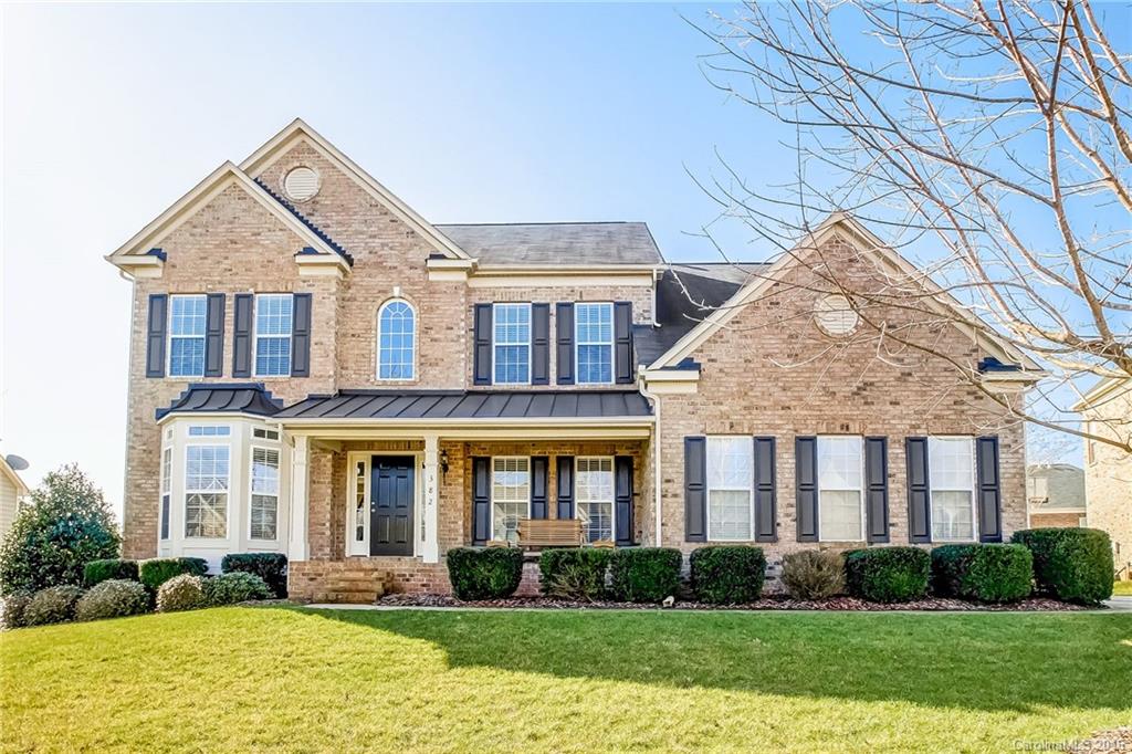 382 Fischer Road Fort Mill, SC 29715 - Photo 1 of 24 a front view of a house with a yard and plants