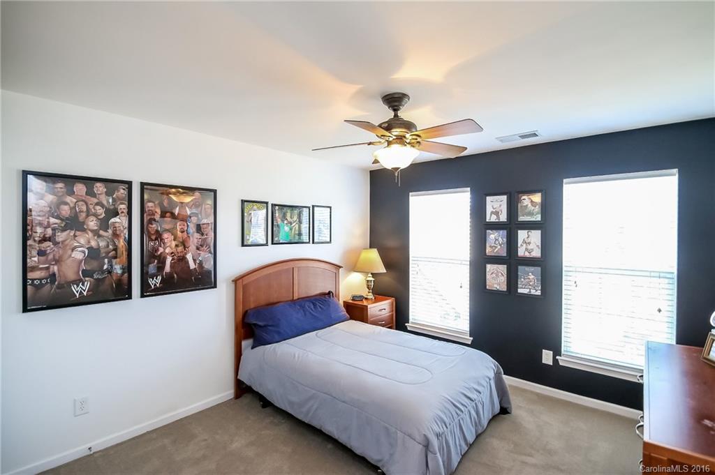 382 Fischer Road Fort Mill, SC 29715 - Photo 17 of 24 a bedroom with a large bed and a window