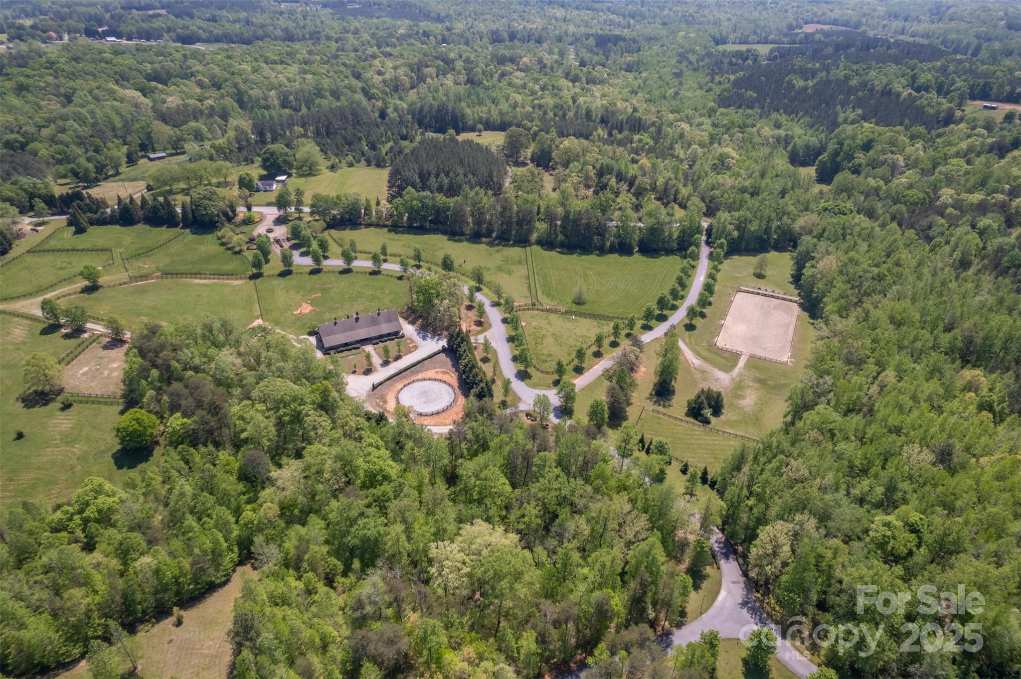 Lot 20 Mapleton Lane Tryon, NC 28782 - Photo 11 of 32 an aerial view of a house with a yard and outdoor seating