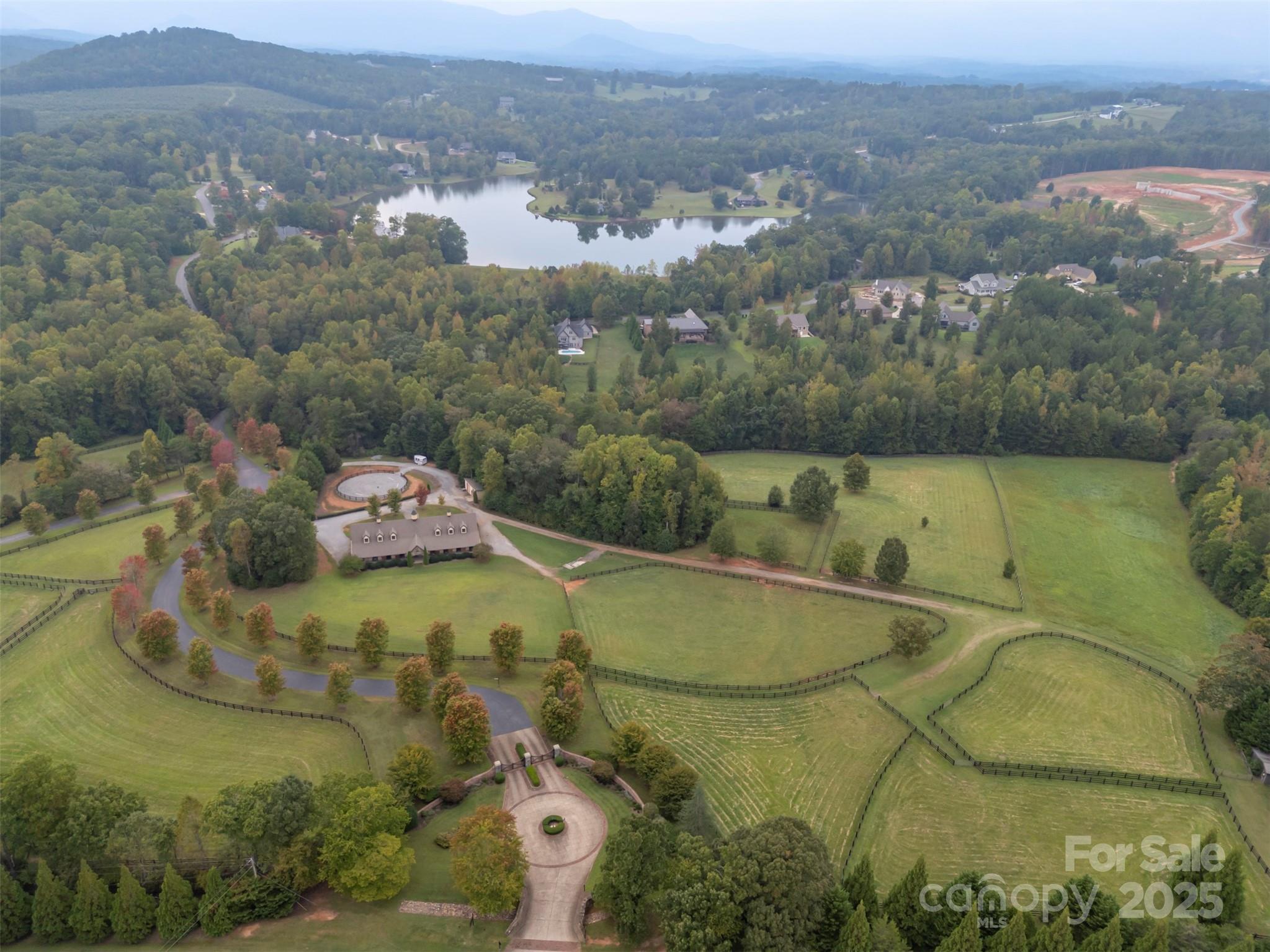 Lot 20 Mapleton Lane Tryon, NC 28782 - Photo 28 of 32 an aerial view of a house with a yard