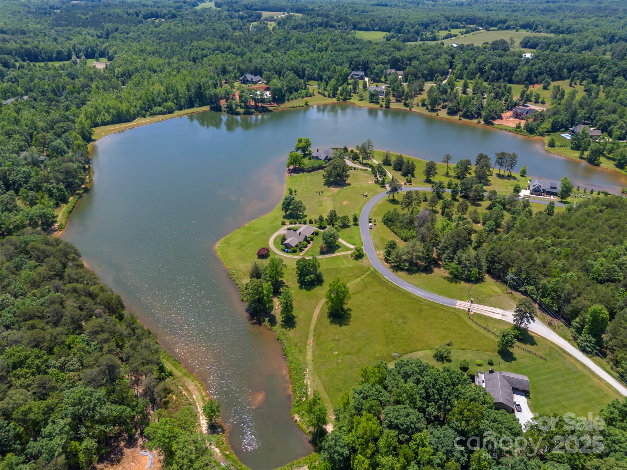 Lot 20 Mapleton Lane Tryon, NC 28782 - Photo 5 of 32 an aerial view of a house with yard swimming pool and outdoor seating