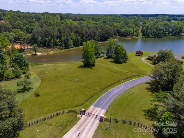 a view of a lake with a yard