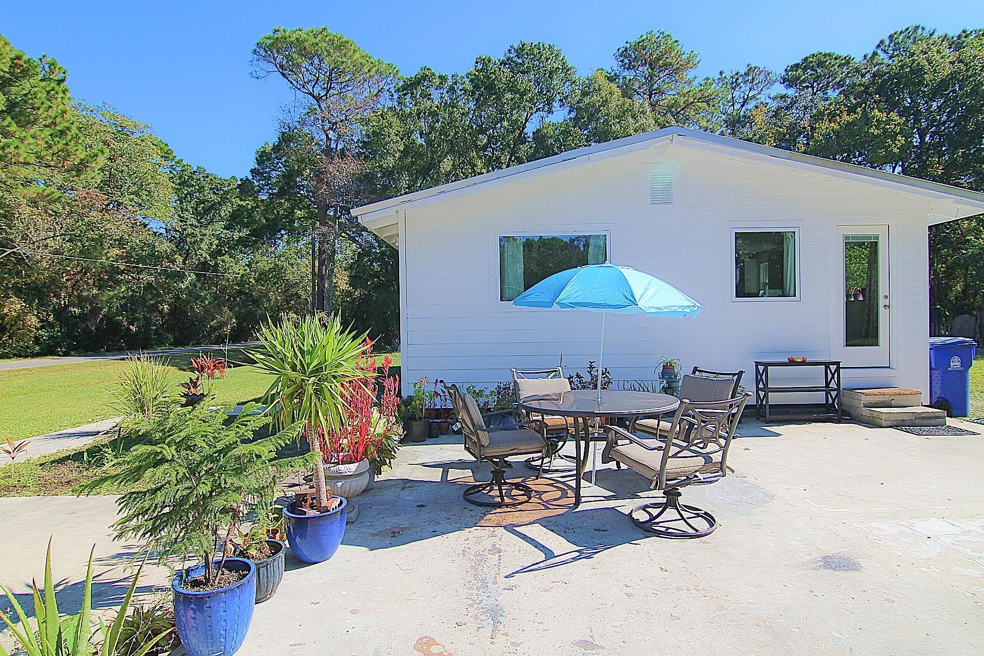 561 Tart Road St. Augustine, FL 32084 - Photo 12 of 15 a swimming pool with outdoor seating and yard