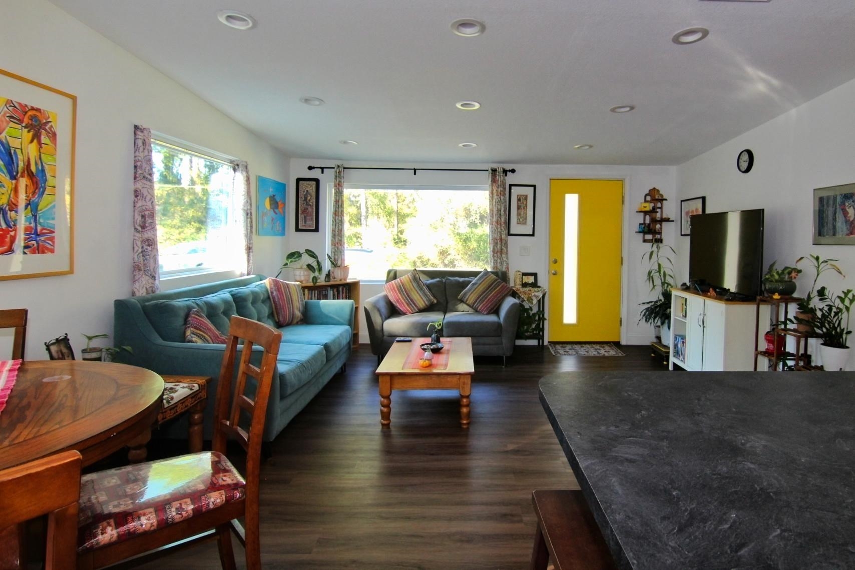 561 Tart Road St. Augustine, FL 32084 - Photo 3 of 15 a living room with furniture and a flat screen tv