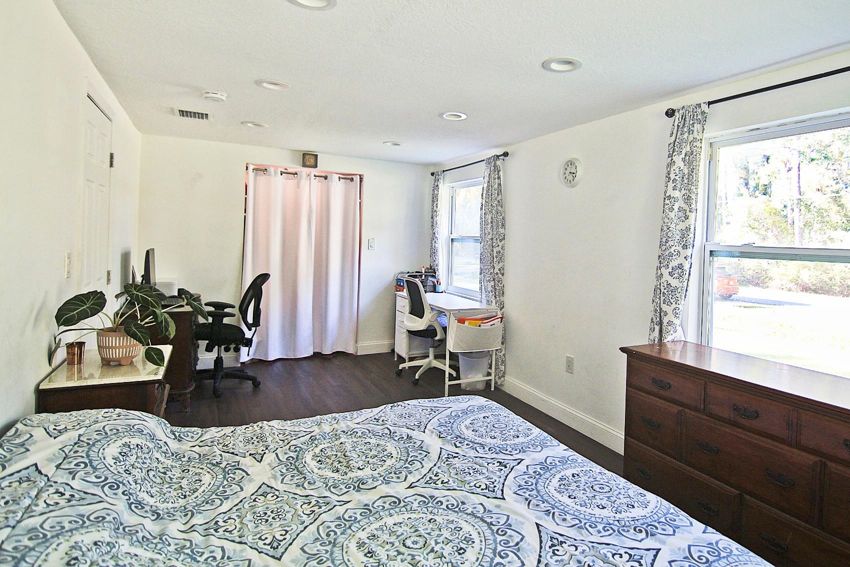 561 Tart Road St. Augustine, FL 32084 - Photo 9 of 15 a bedroom with furniture and a window