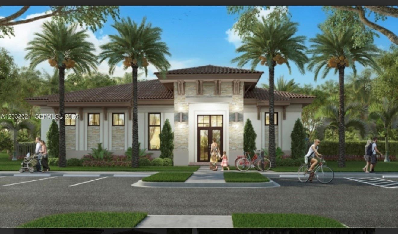 11942 Southwest 243rd Street Homestead, FL 33032 - Photo 39 of 50 a front view of multiple houses with yard
