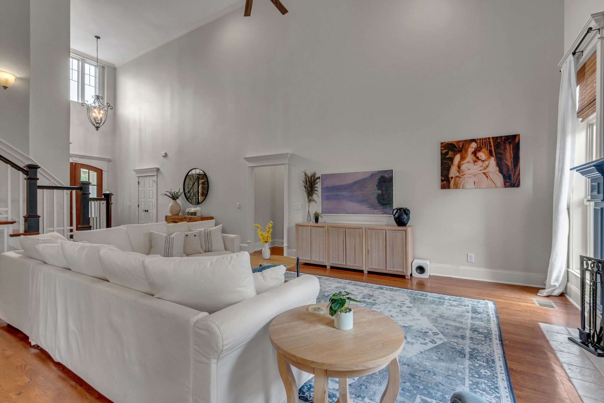 1051 Fitzroy Circle Spring Hill, TN 37174 - Photo 14 of 38 a living room with furniture and a dining table with wooden floor