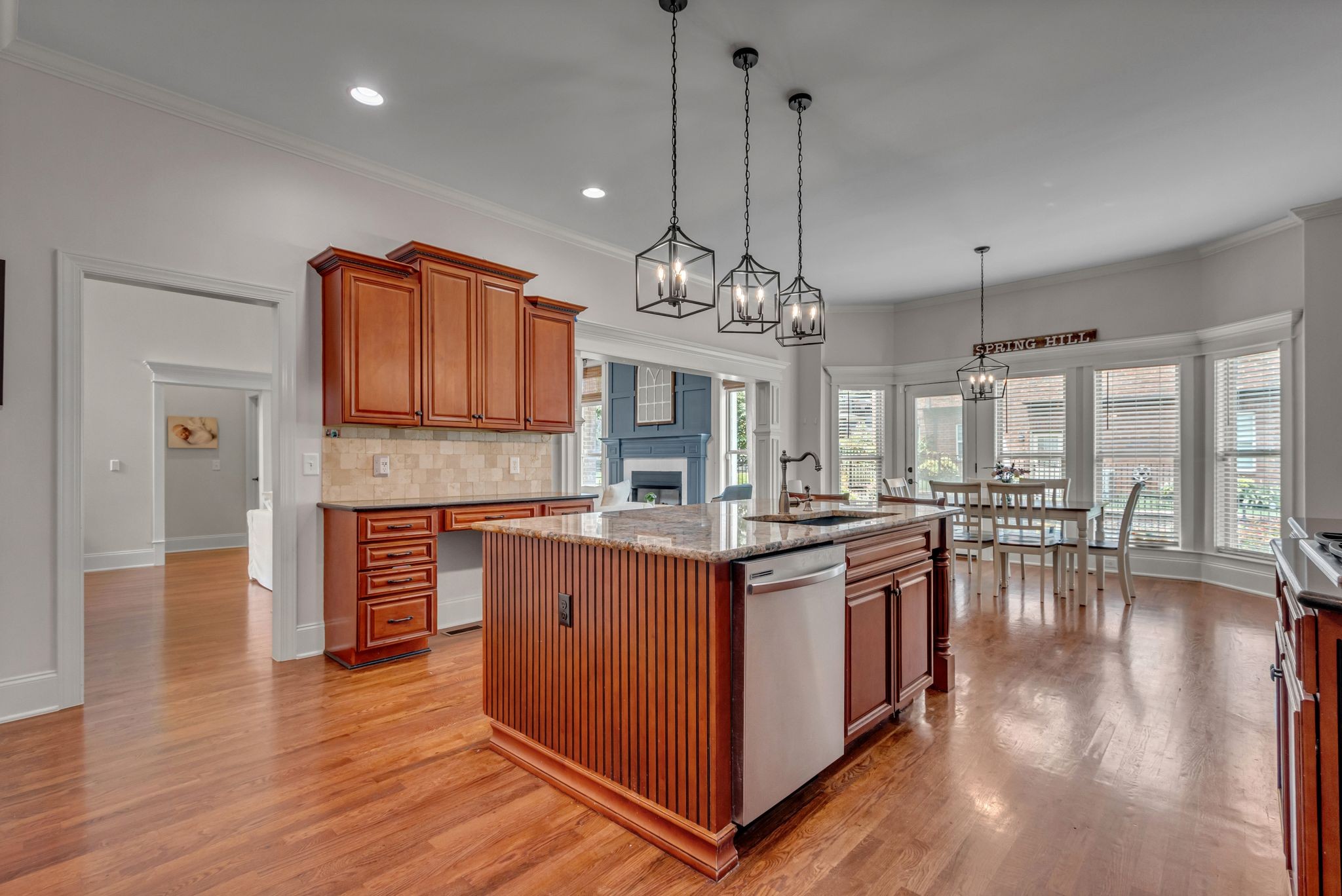 1051 Fitzroy Circle Spring Hill, TN 37174 - Photo 18 of 38 a kitchen with stainless steel appliances granite countertop a stove and cabinets