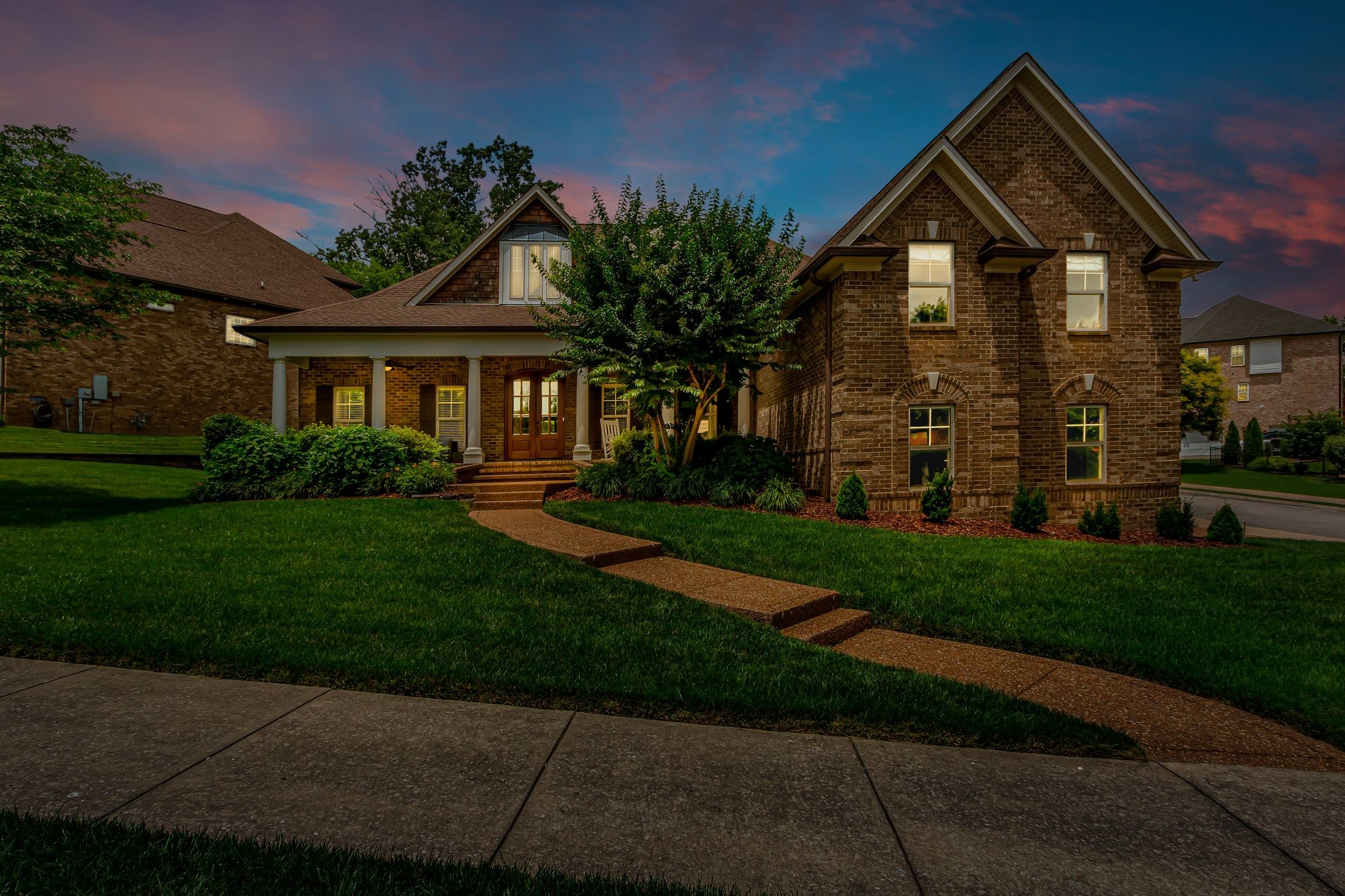 1051 Fitzroy Circle Spring Hill, TN 37174 - Photo 2 of 38 a front view of a house with a yard