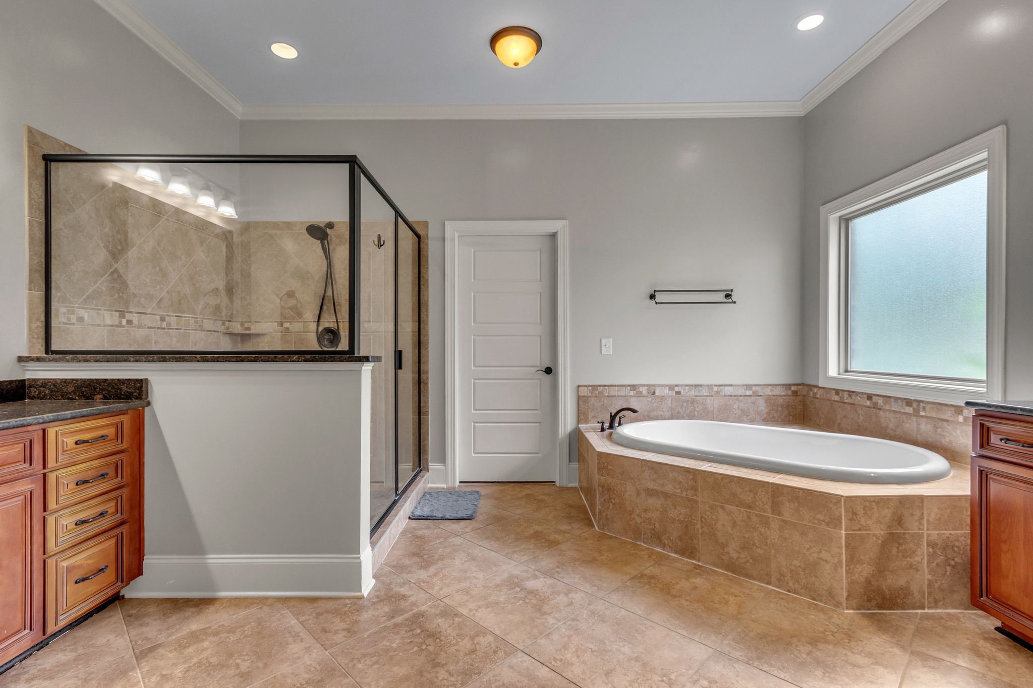 1051 Fitzroy Circle Spring Hill, TN 37174 - Photo 23 of 38 a spacious bathroom with a tub and a shower