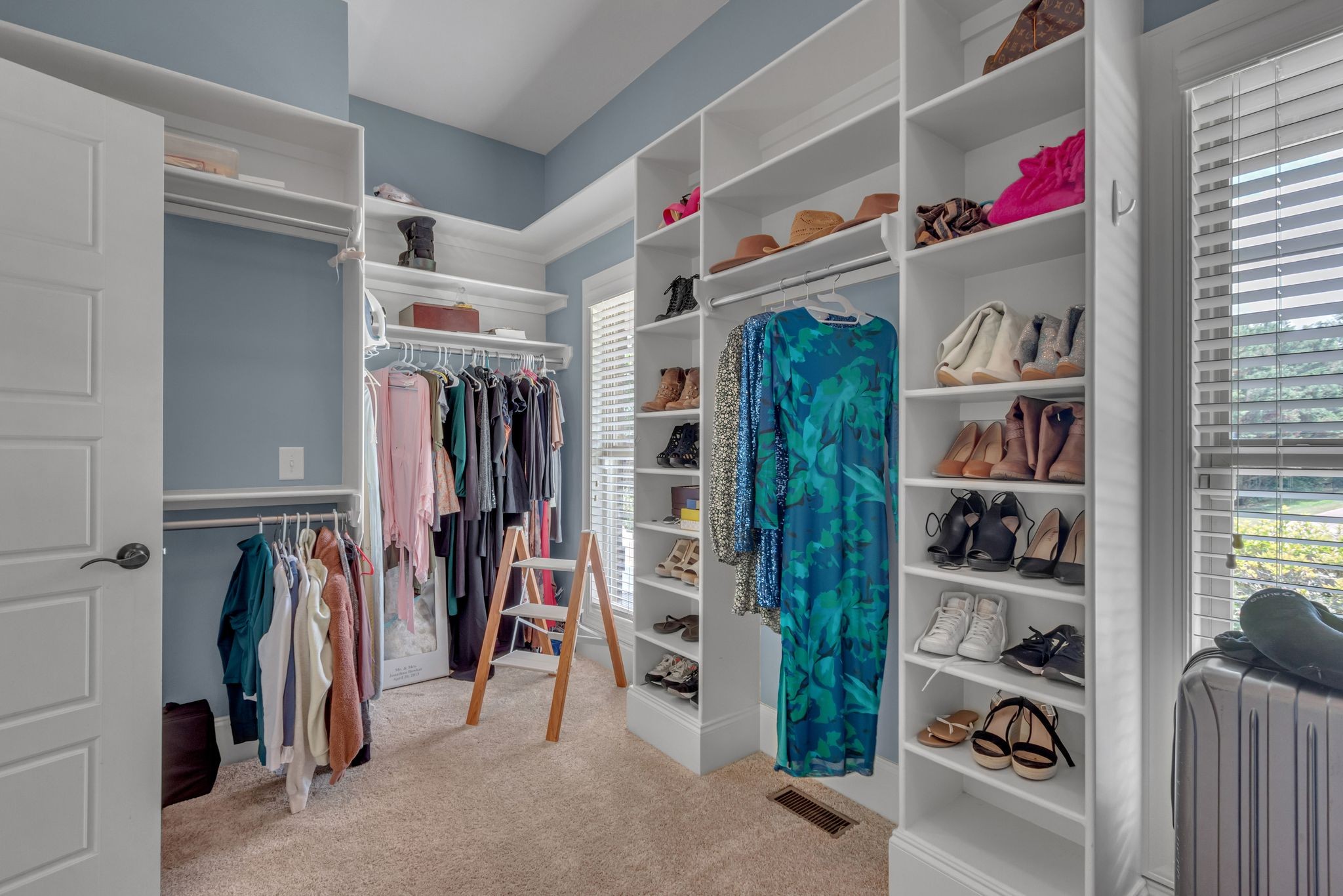 1051 Fitzroy Circle Spring Hill, TN 37174 - Photo 27 of 38 a view of walk in closet with clothes and shoes