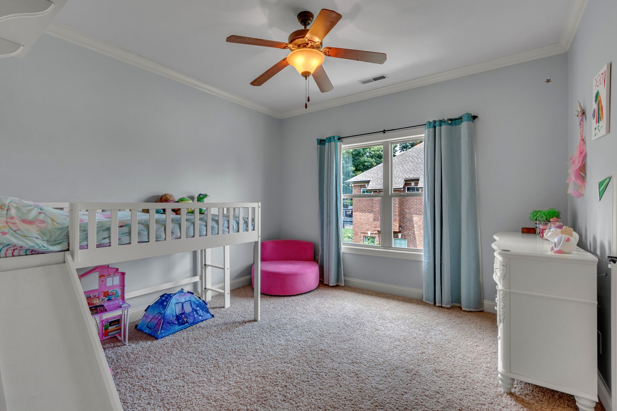 1051 Fitzroy Circle Spring Hill, TN 37174 - Photo 31 of 38 a living room with furniture and a chandelier