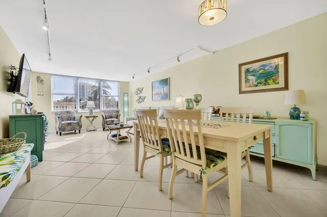 a view of a dining room with furniture