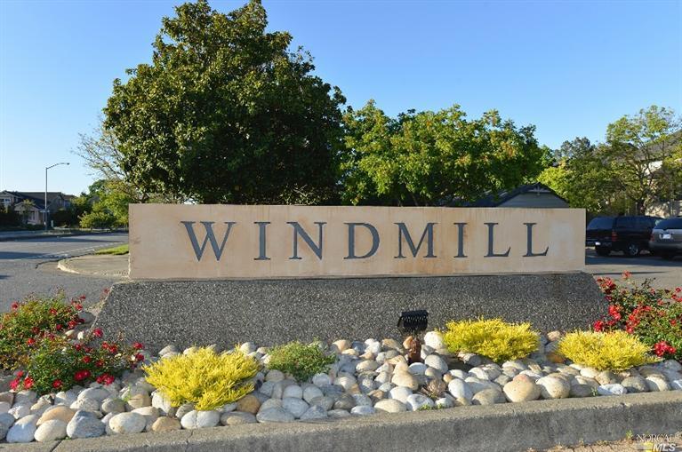 a view of sign board with flowers