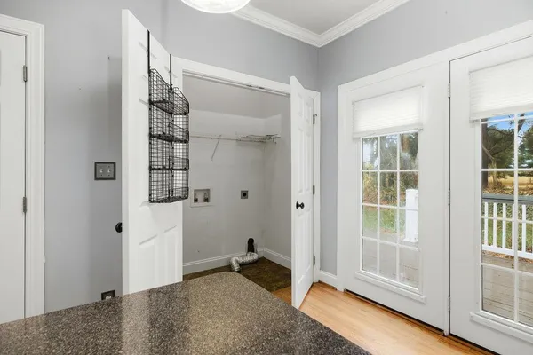 a view of entryway with wooden floor