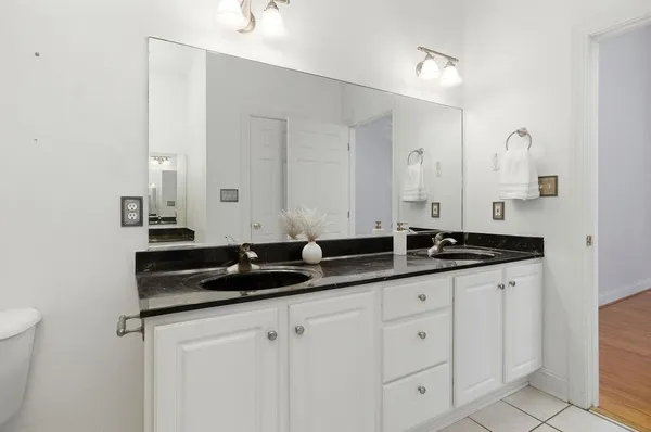 a close view of a sink and a mirror