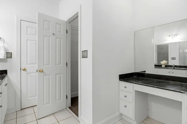 a view of a sink and mirror