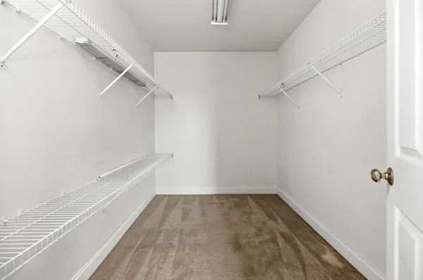 a view of a room with racks on the wall