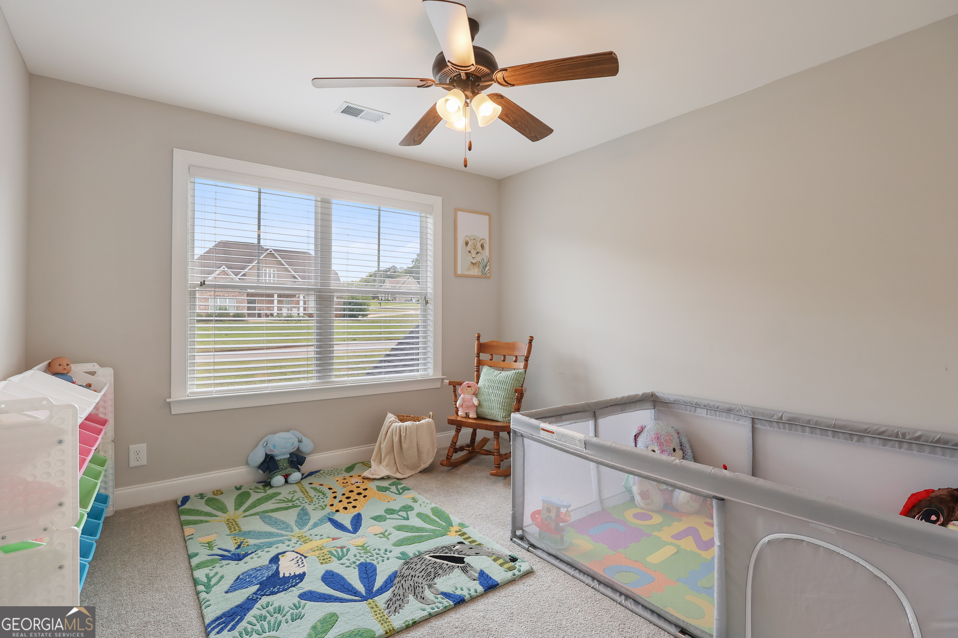 89 Claire Road Forsyth, GA 31029 - Photo 30 of 40 a bedroom with furniture and a window