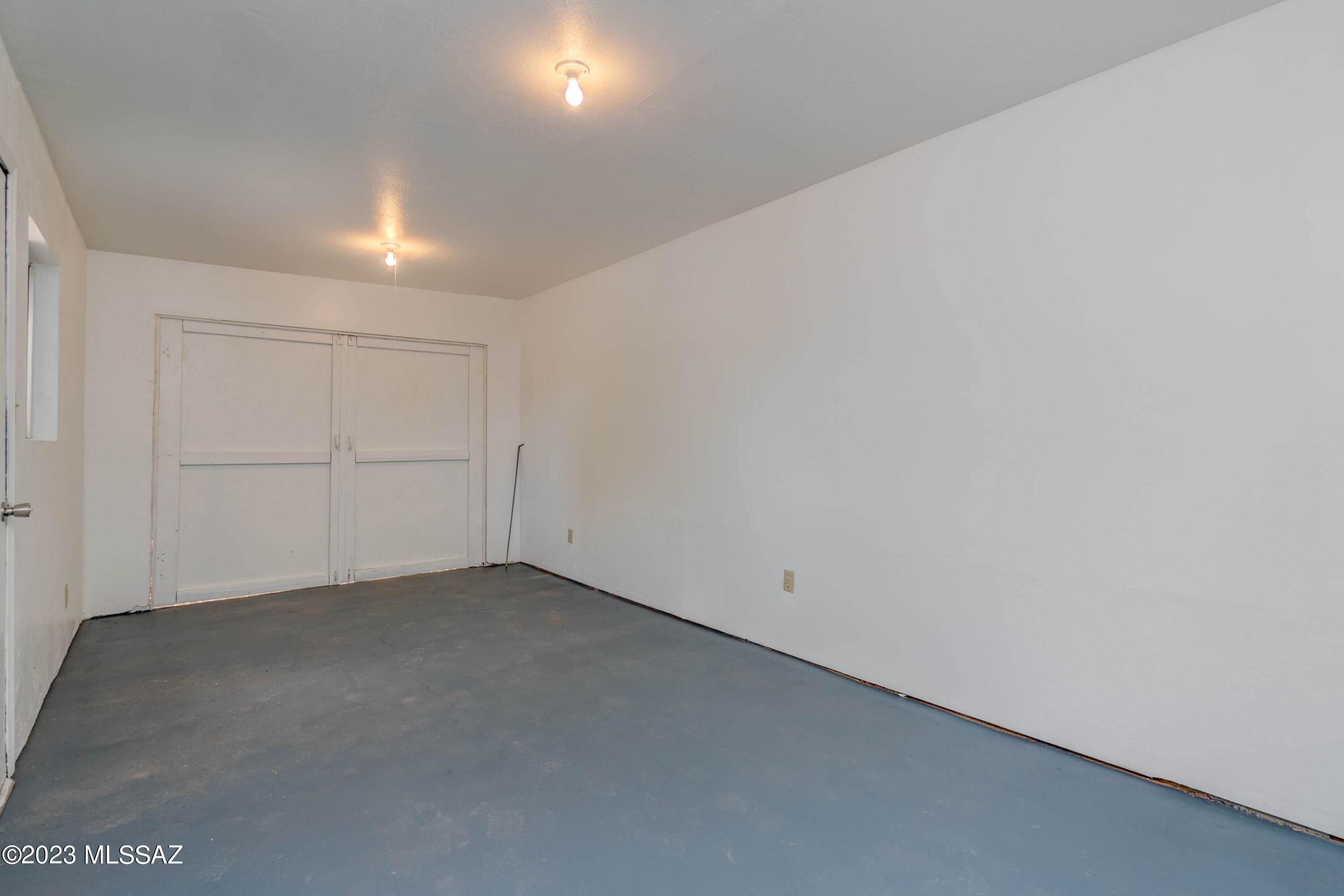 1845 West Caravelle Road Tucson, AZ 85713 - Photo 24 of 31 an empty room with closet in kitchen