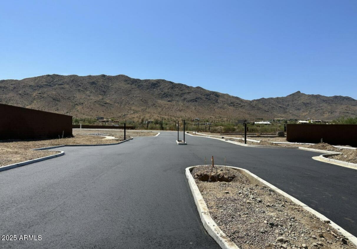 2315 West Pearce Road Phoenix, AZ 85041 - Photo 5 of 52 PRADA - Gated Community Entrance