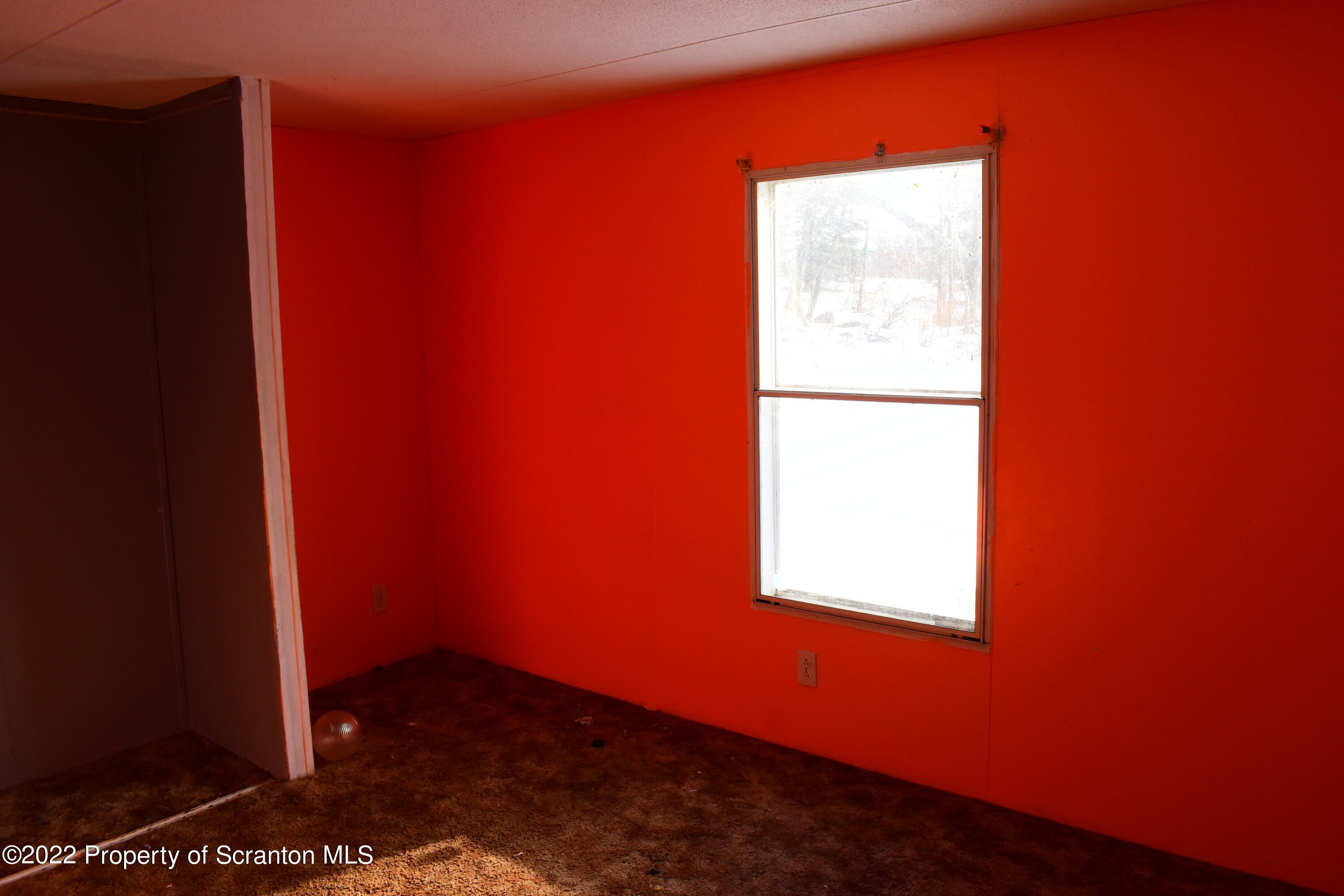 422 Ervine Road Montrose, PA 18801 - Photo 8 of 14 a view of an empty room and window