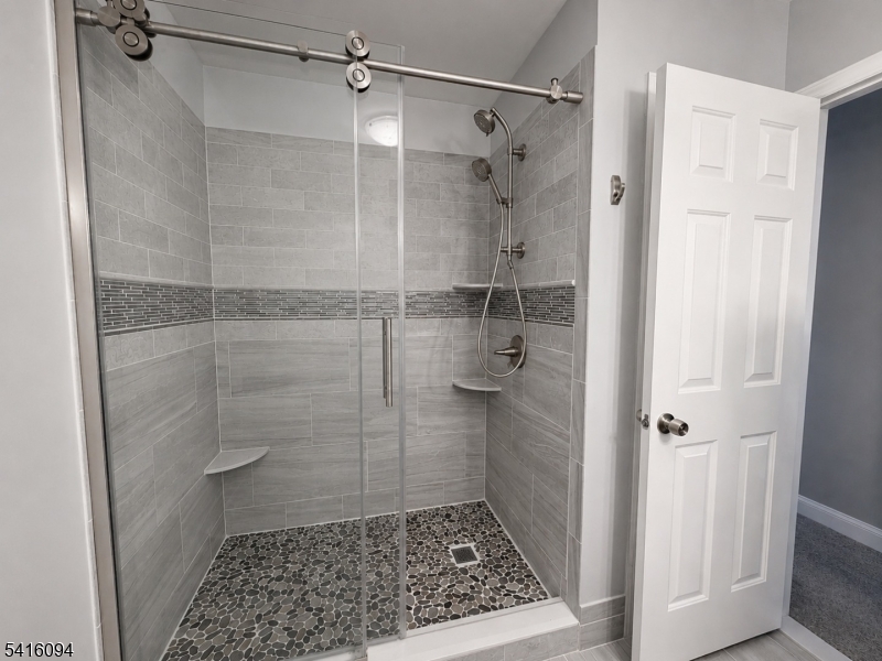 91 Delaware Lane, Unit 91 Somerville, NJ 08876 - Photo 18 of 32 a bathroom with a shower